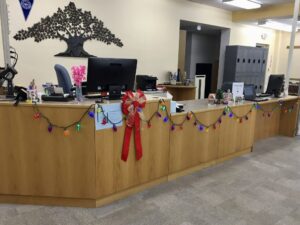 library service desk made of light wood